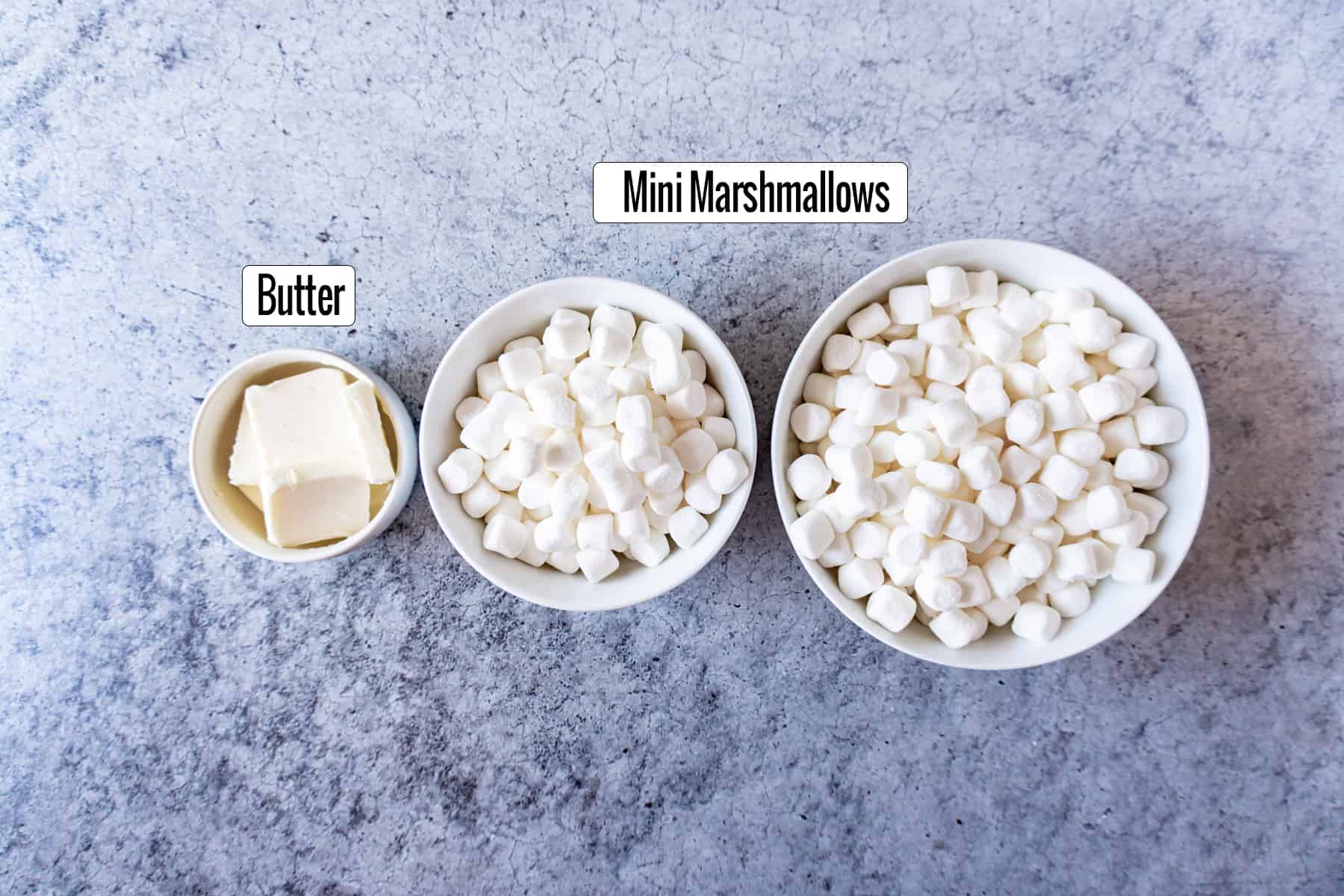 Ingredients in bowls marshmallows and butter