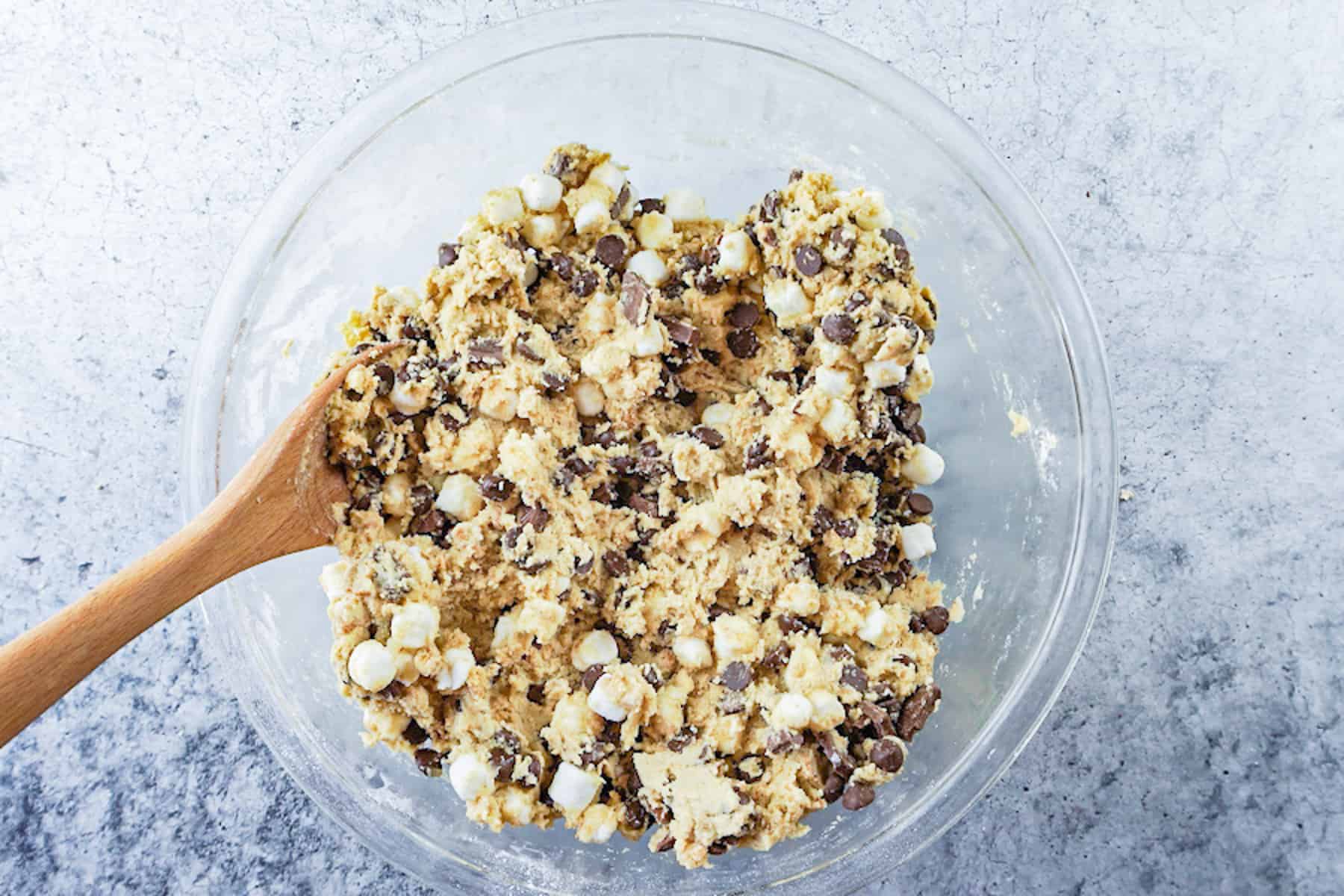 S'more cookie dough in bowl with wooden spoon