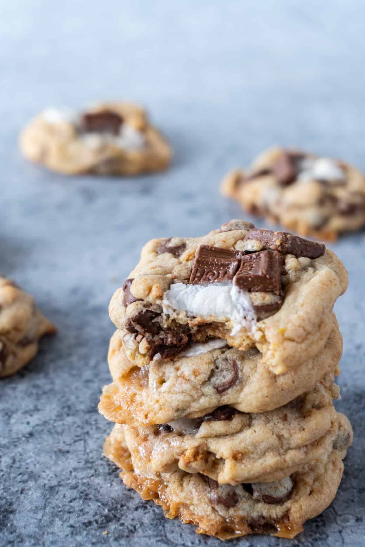 S'more cookies stacked with bite taken out of top one