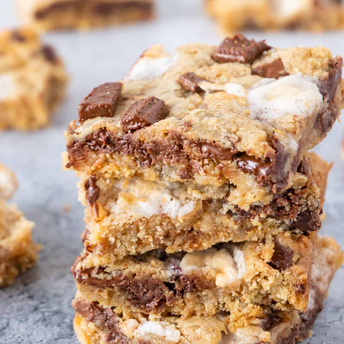 s'more cookie bars stacked featured image