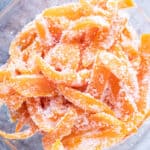 candied orange peels in bowl