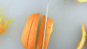 slicing orange peels
