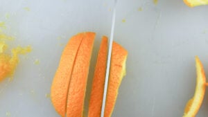 slicing orange peels