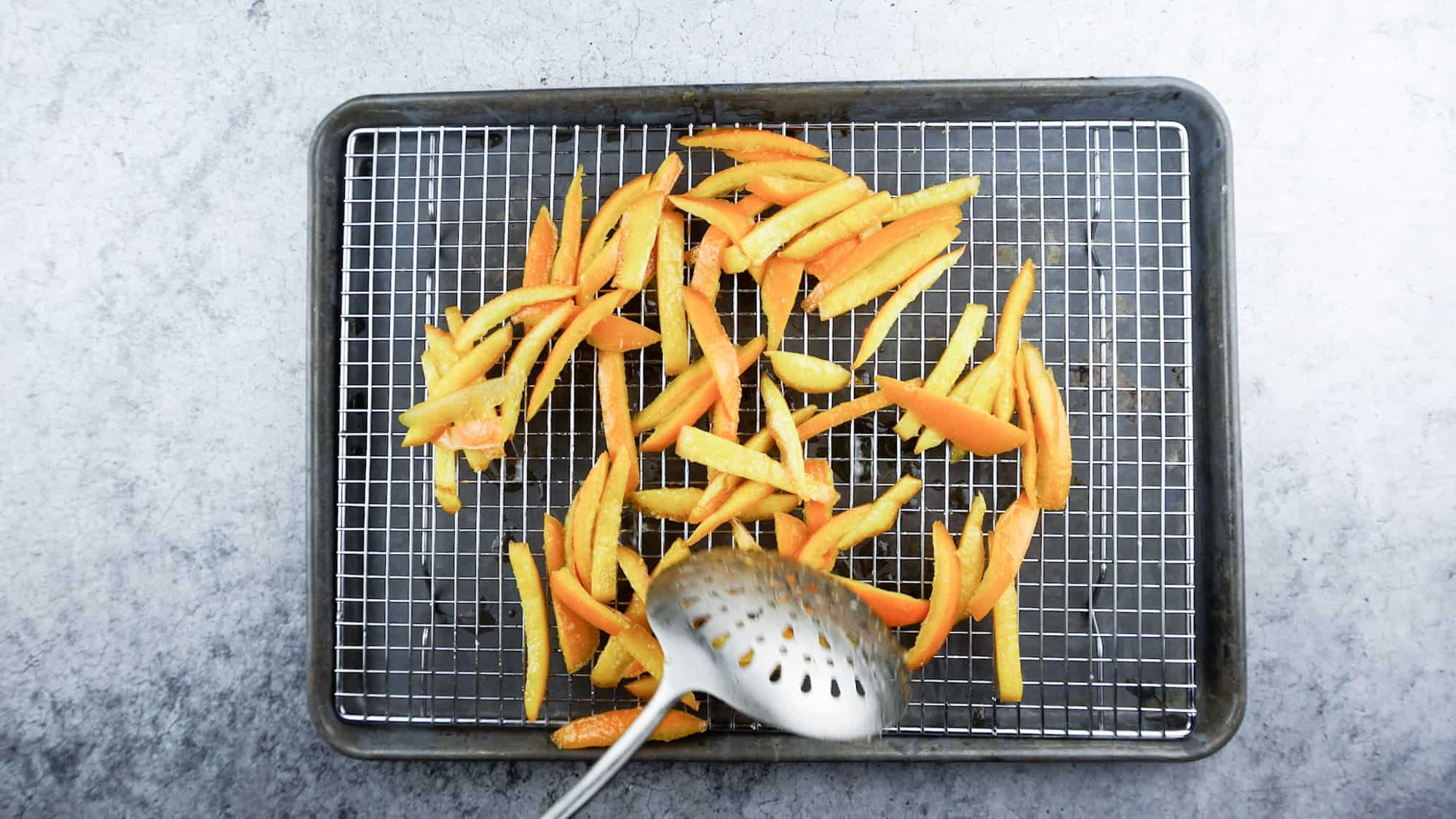 orange peels on cooling rack drying