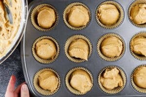 pumpkin cupcakes unbaked in cupcake tin