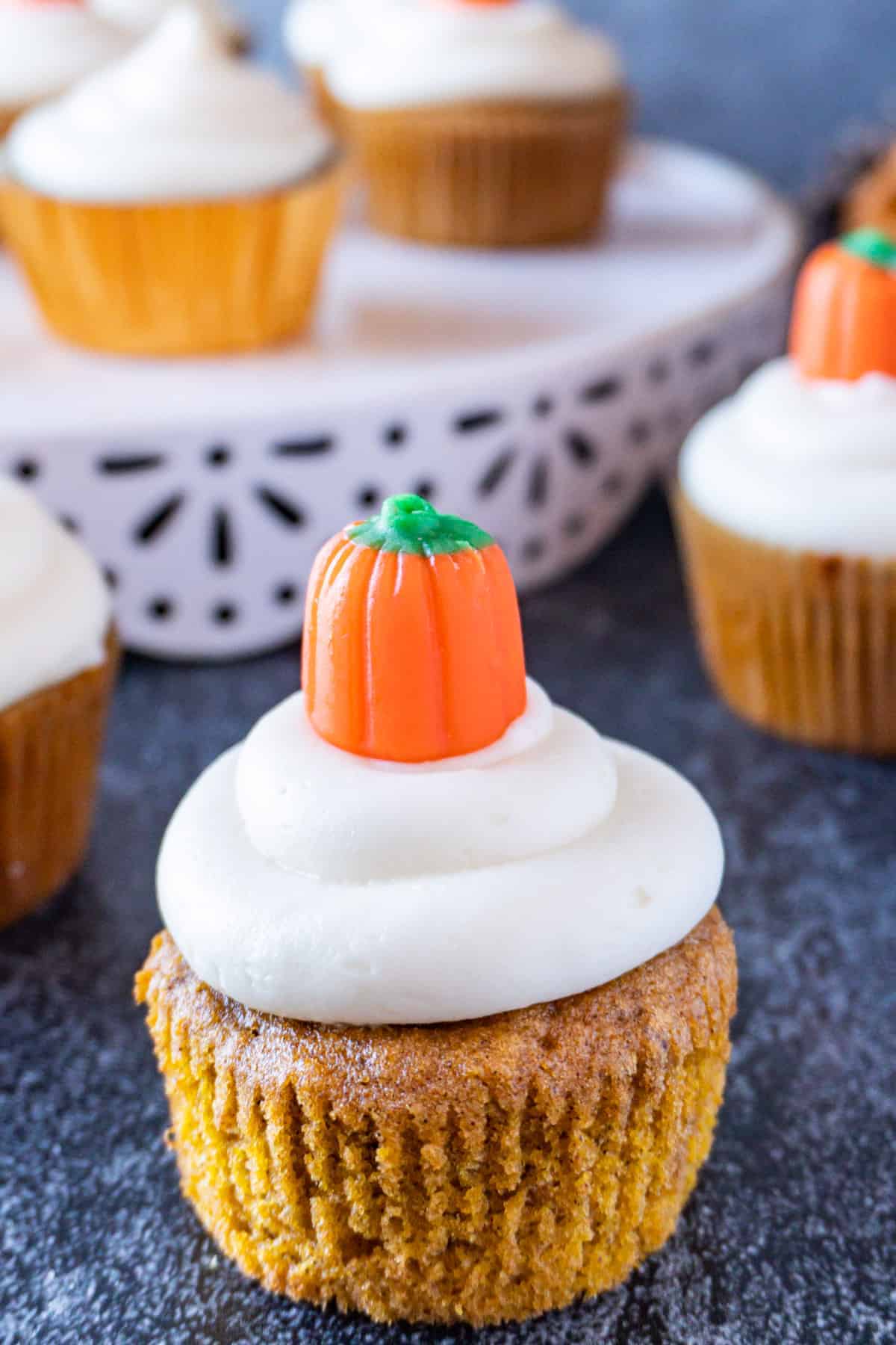 pumpkin cupcake with cream cheese frosting close up