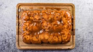 sticky buns on cutting board flipped over