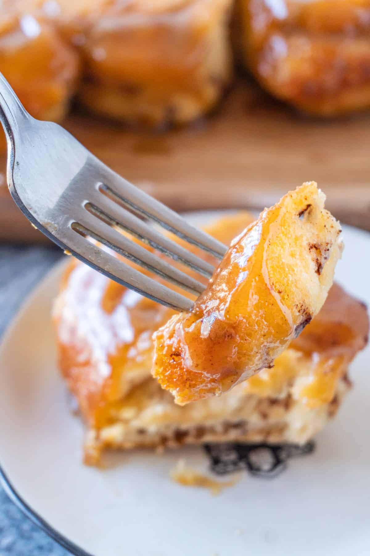 Piece of sticky bun on fork