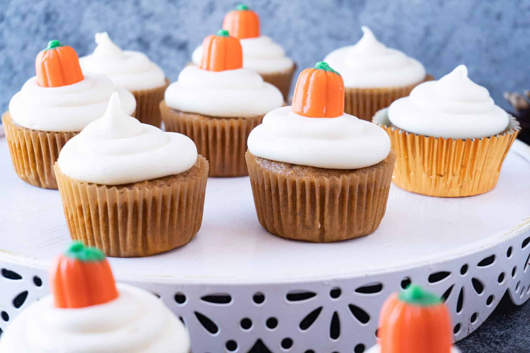 pumpkin cupcakes on a platter