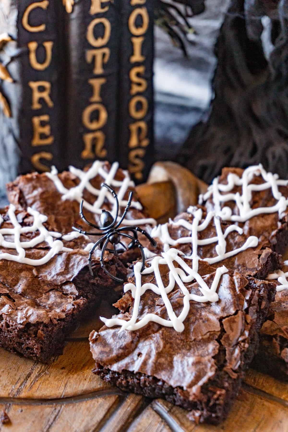 Spider web brownies on a platter