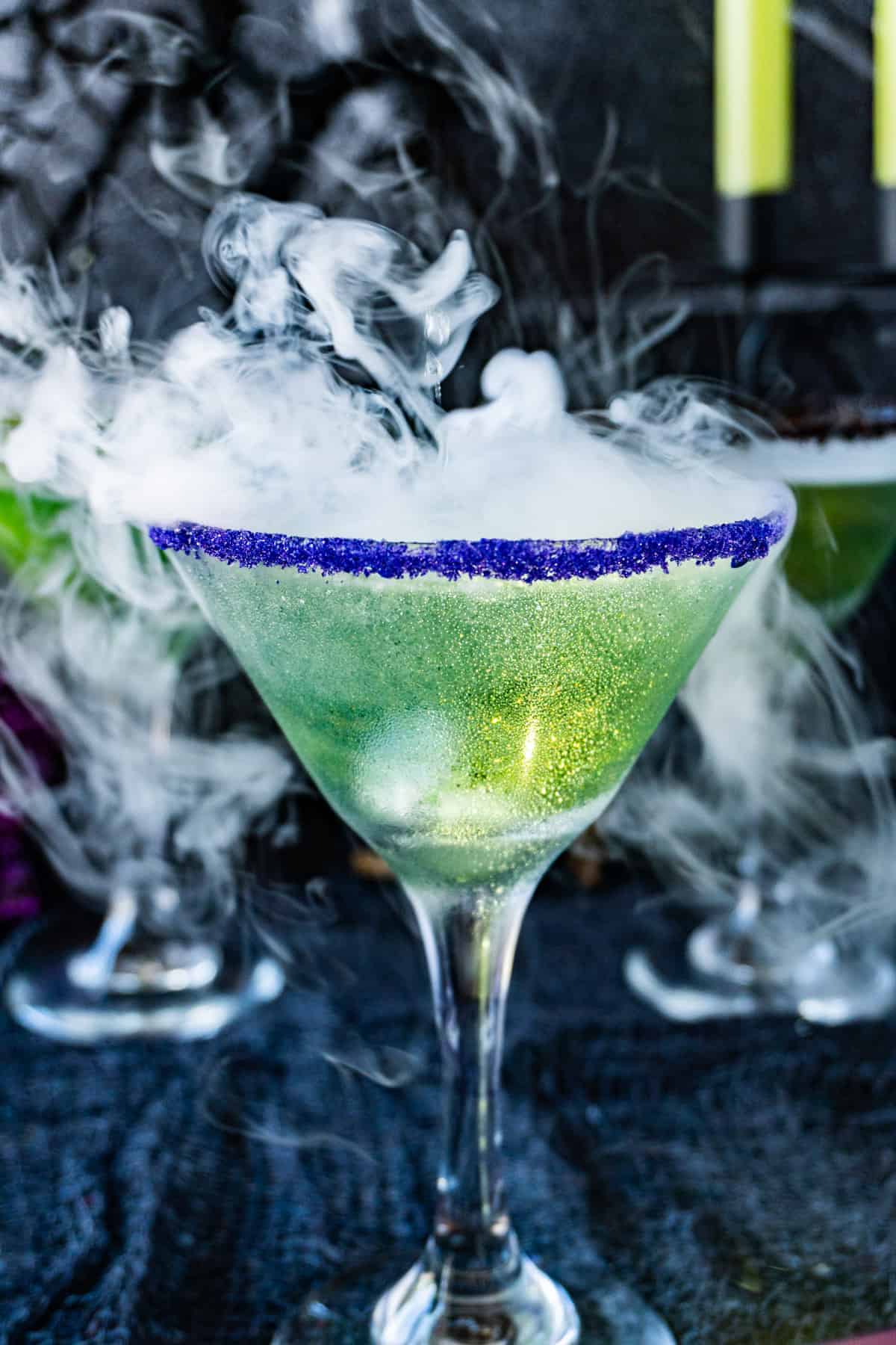 Witches Brew Cocktail with dry ice - full glass view