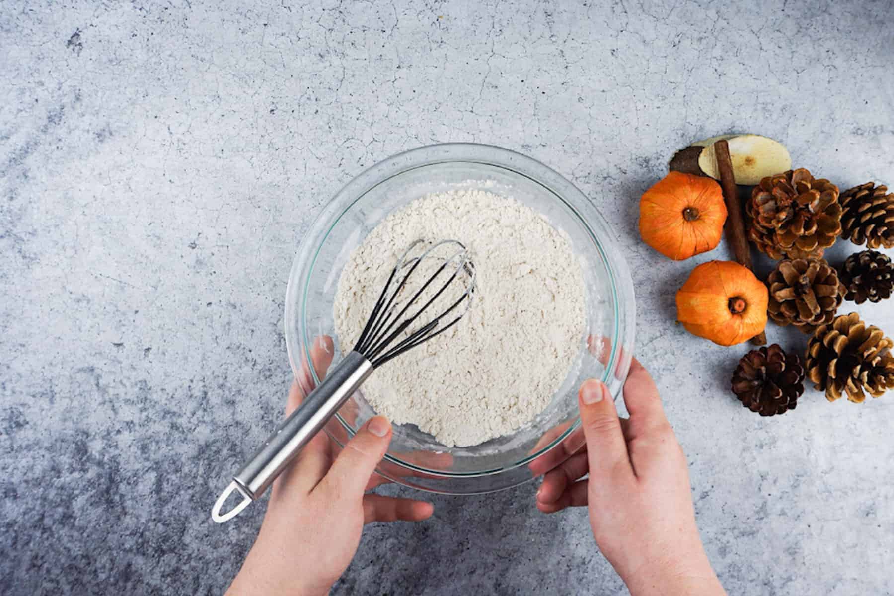 Flour mixture mixed in clear glass bowl.
