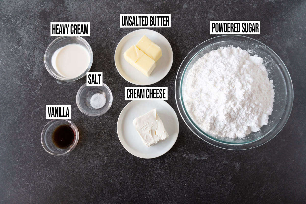 cream cheese frosting ingredients in their own bowls.