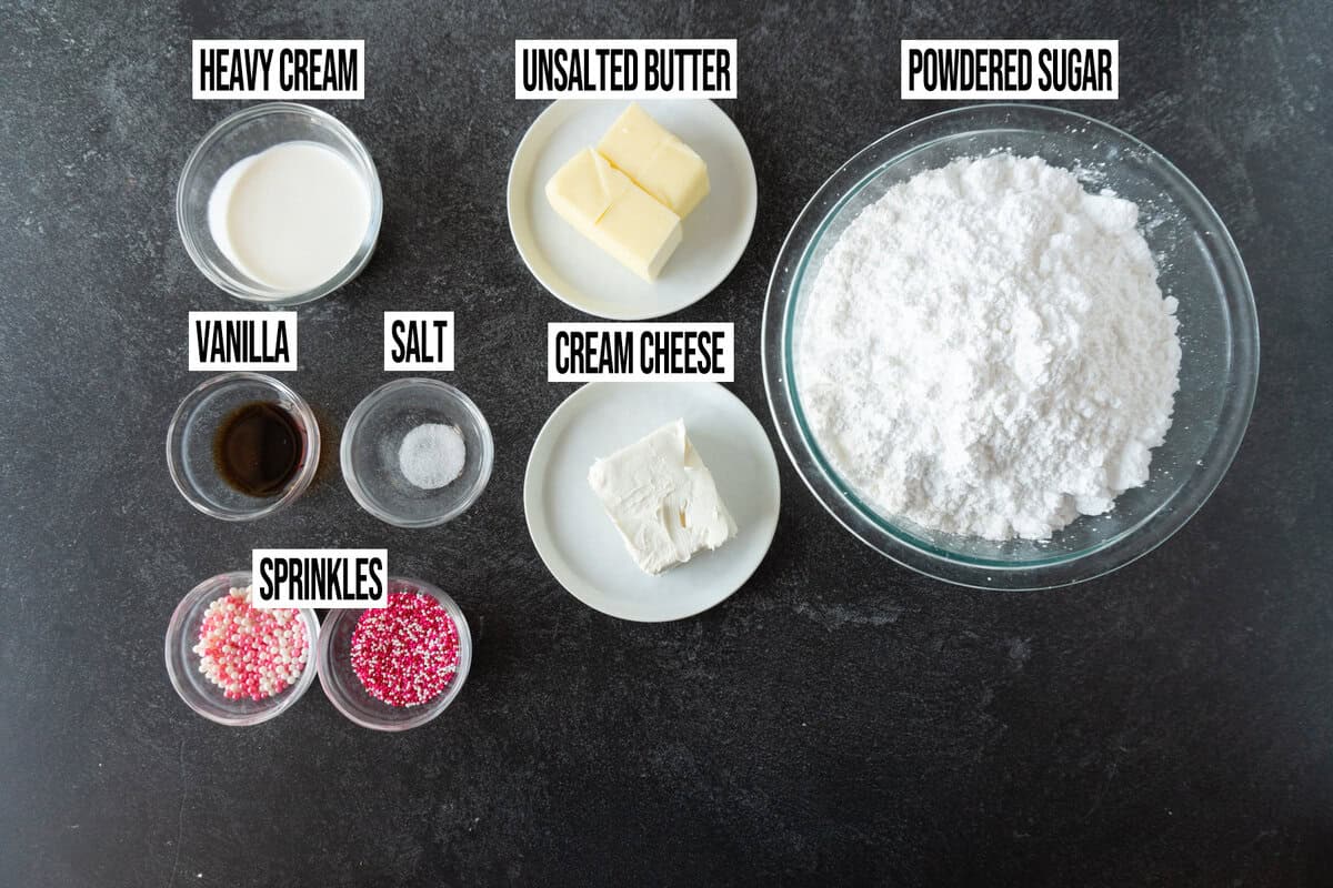 cream cheese frosting ingredients in their own bowls.