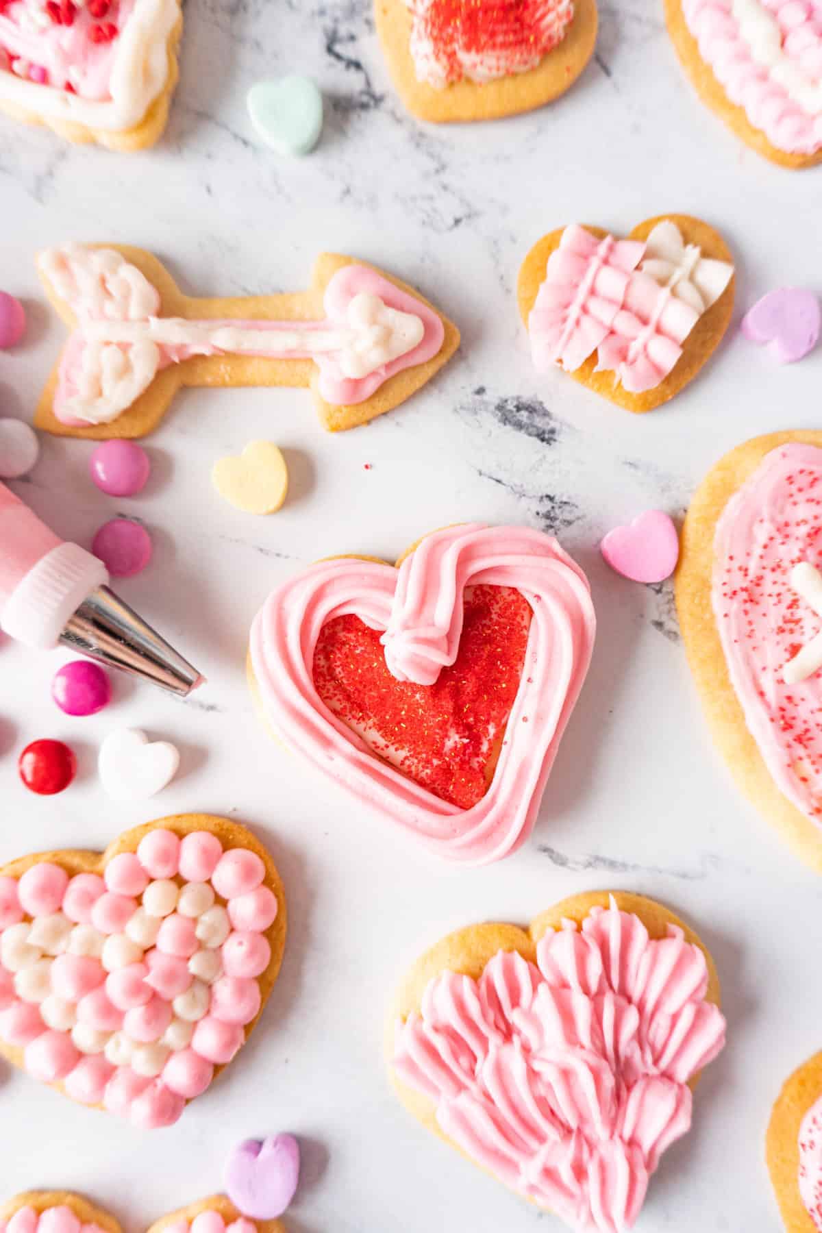 sugar cookies decorated with frosting and sprinkles