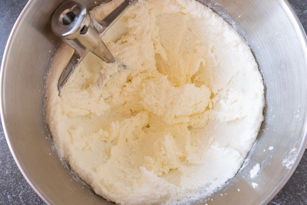 butter and sugar whipped until fluffy in metal bowl.