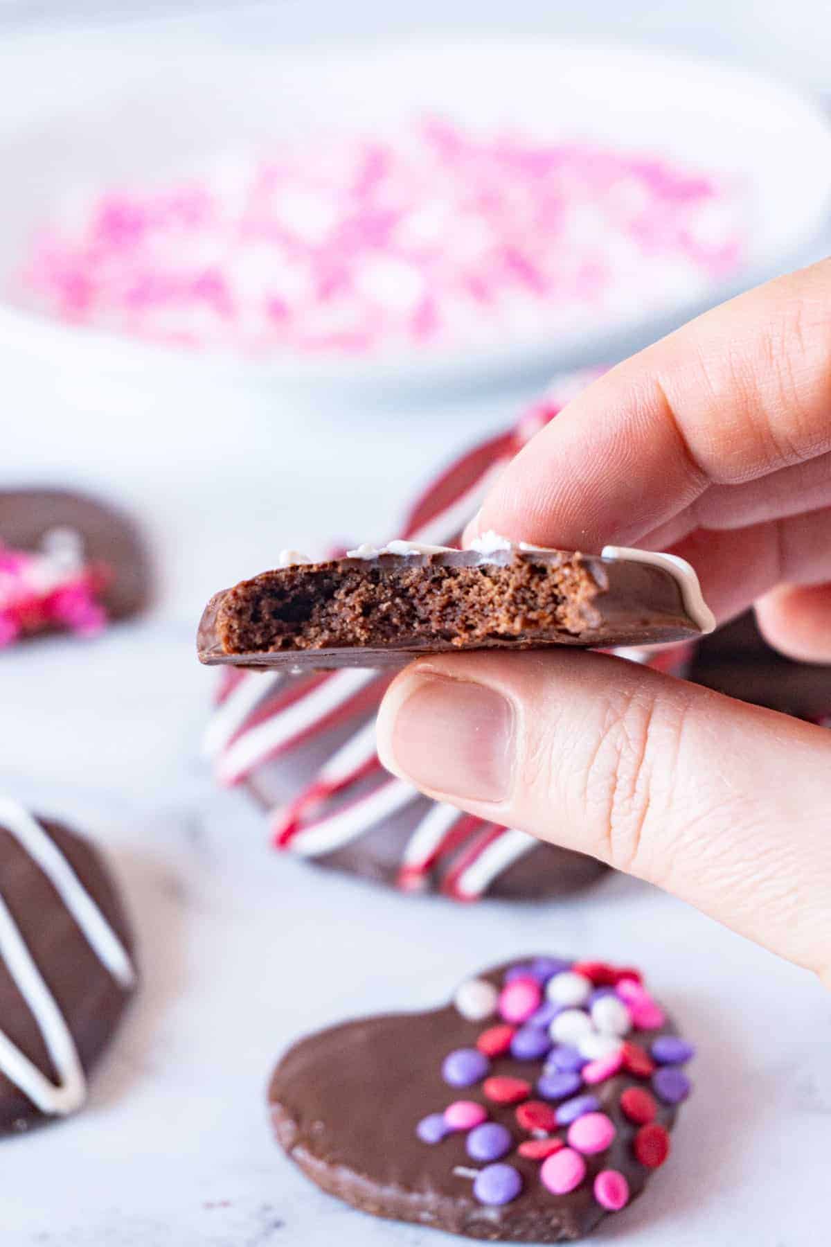 chocolate cherry cookie with bite taken out