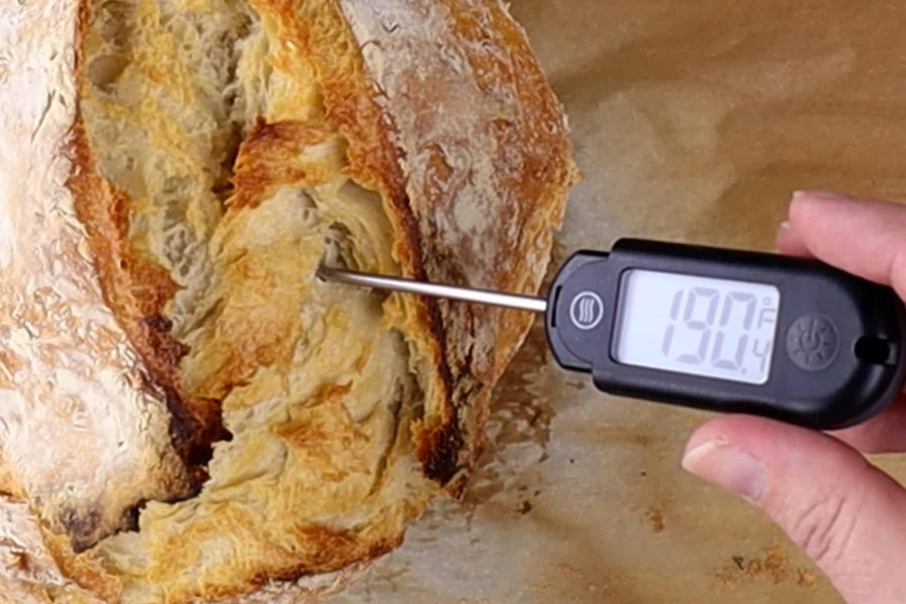 thermometer in baked bread showing 190°F