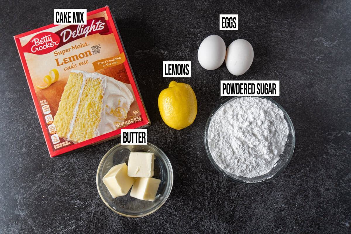 lemon crinkle cookies ingredients labeled and in individual bowls.