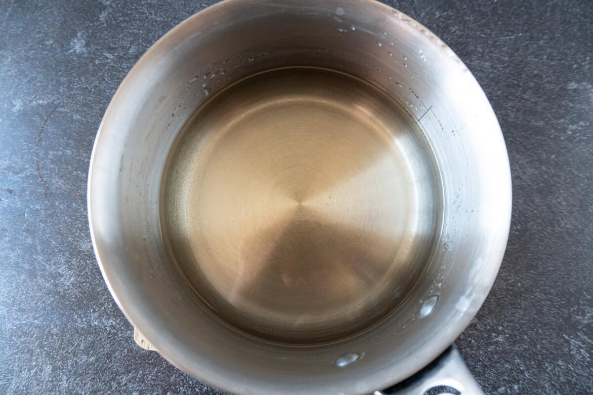 simple syrup in stainless steel sauce pan.