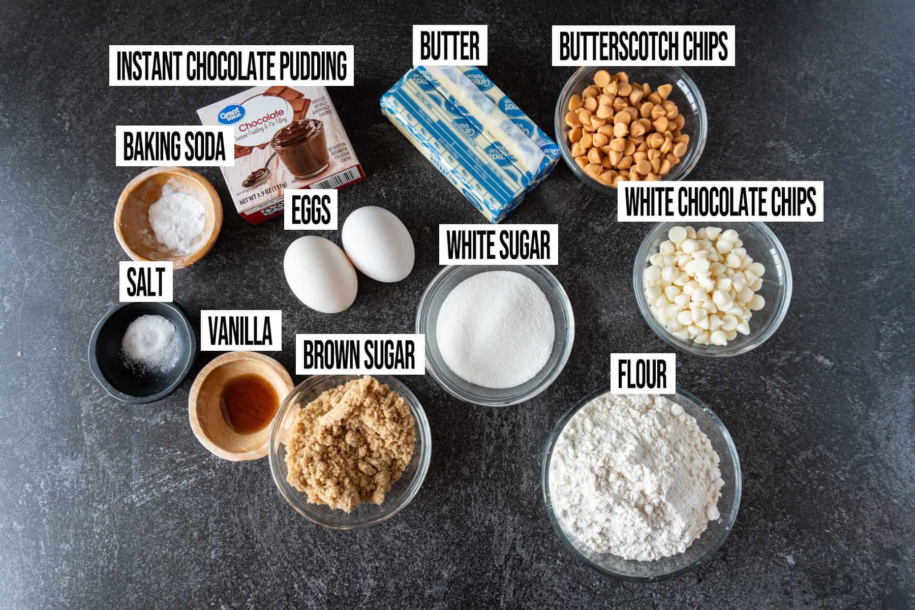 chocolate pudding cookies ingredients in individual bowls and labeled.