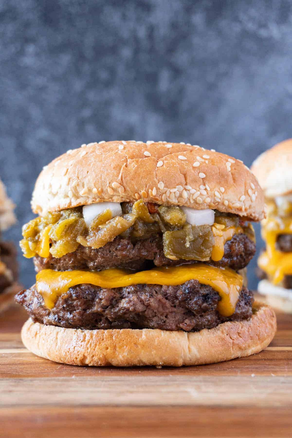 Double patty cheeseburger with green chile