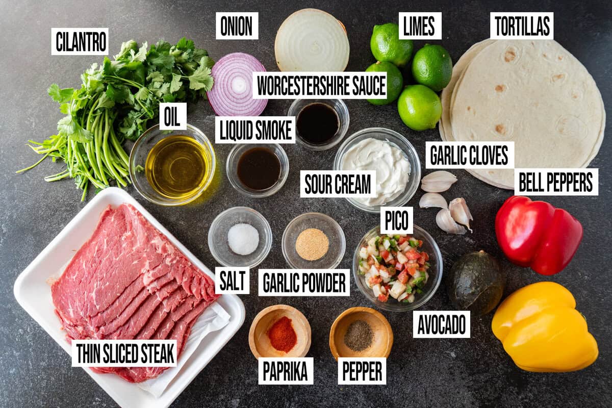 fajita taco ingredients laid out individually and labeled.