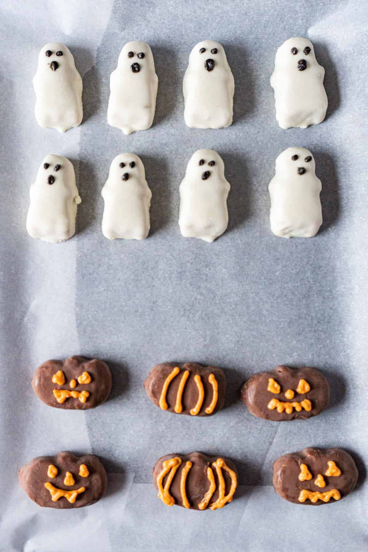 Decorating the pumpkin and ghost candy