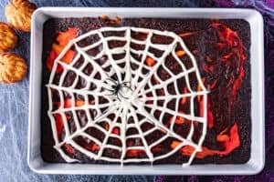 spiderweb brownies in pan flat lay