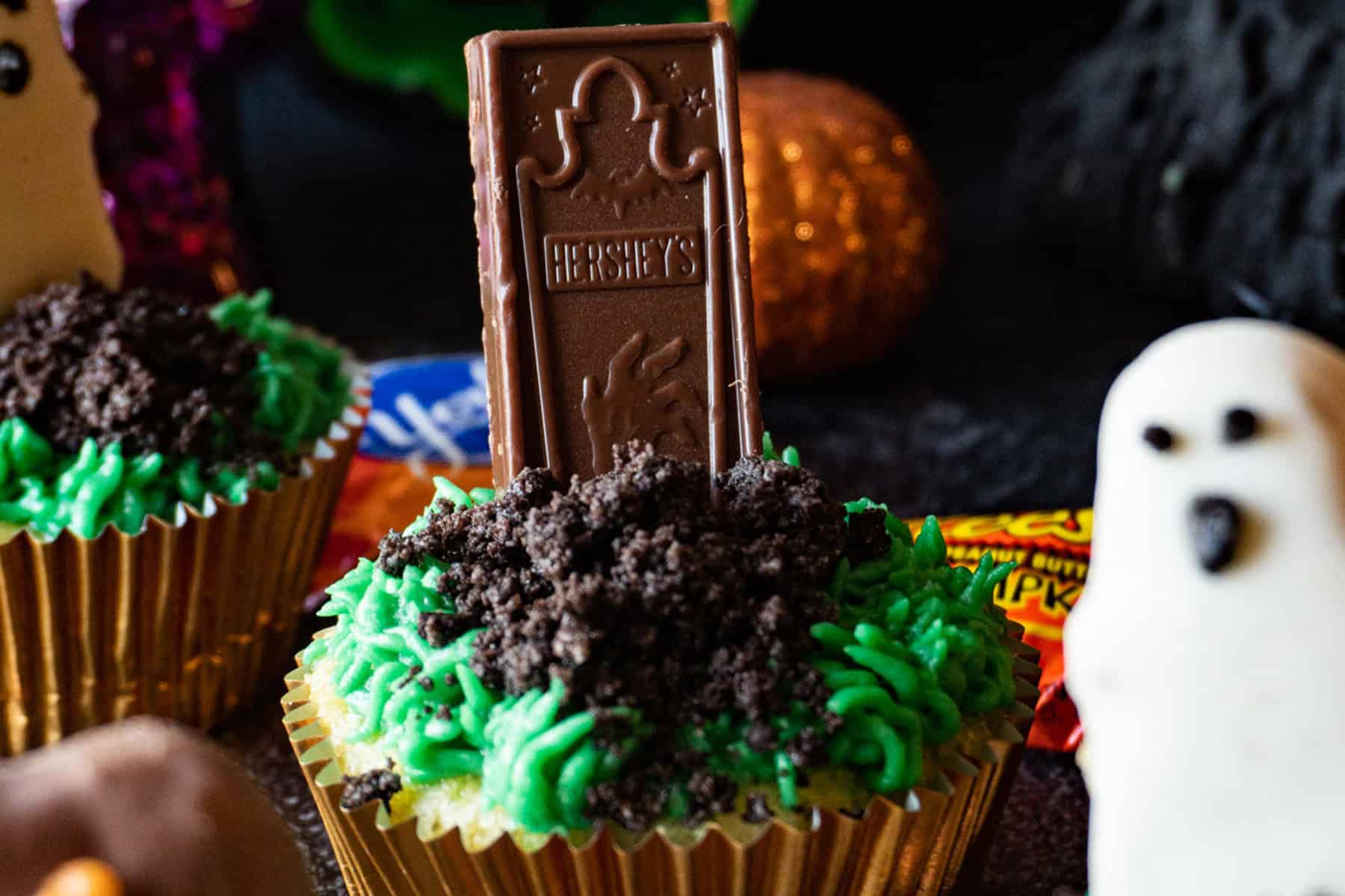 Halloween Graveyard Cupcake with Hershey Chocolate Tombstone added to Crushed Oreo Mound on top of cupcake.