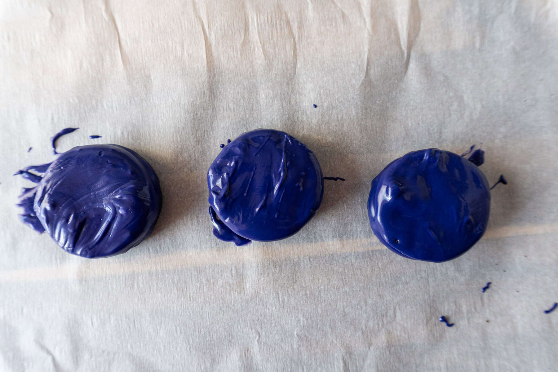 Oreos dipped in purple candy melts.