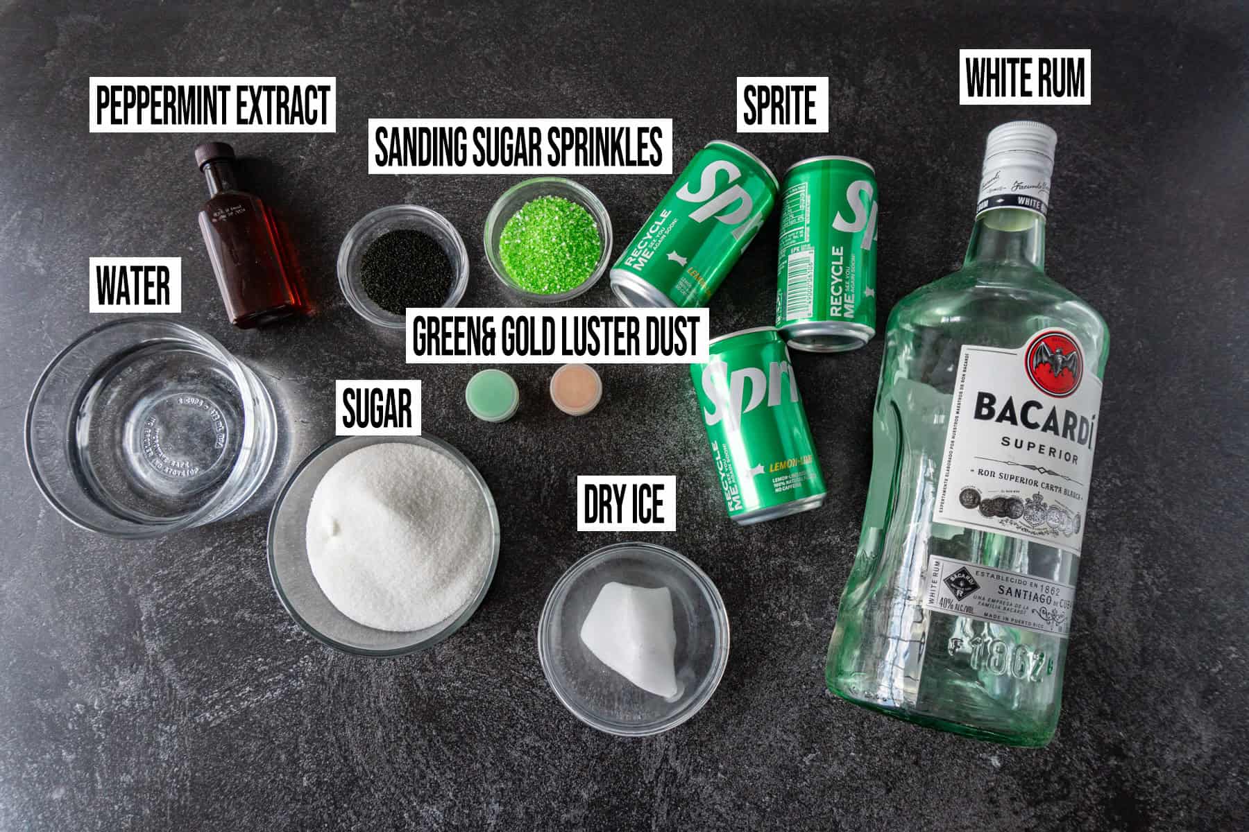 Witches brew ingredients in individual bowls and labeled.
