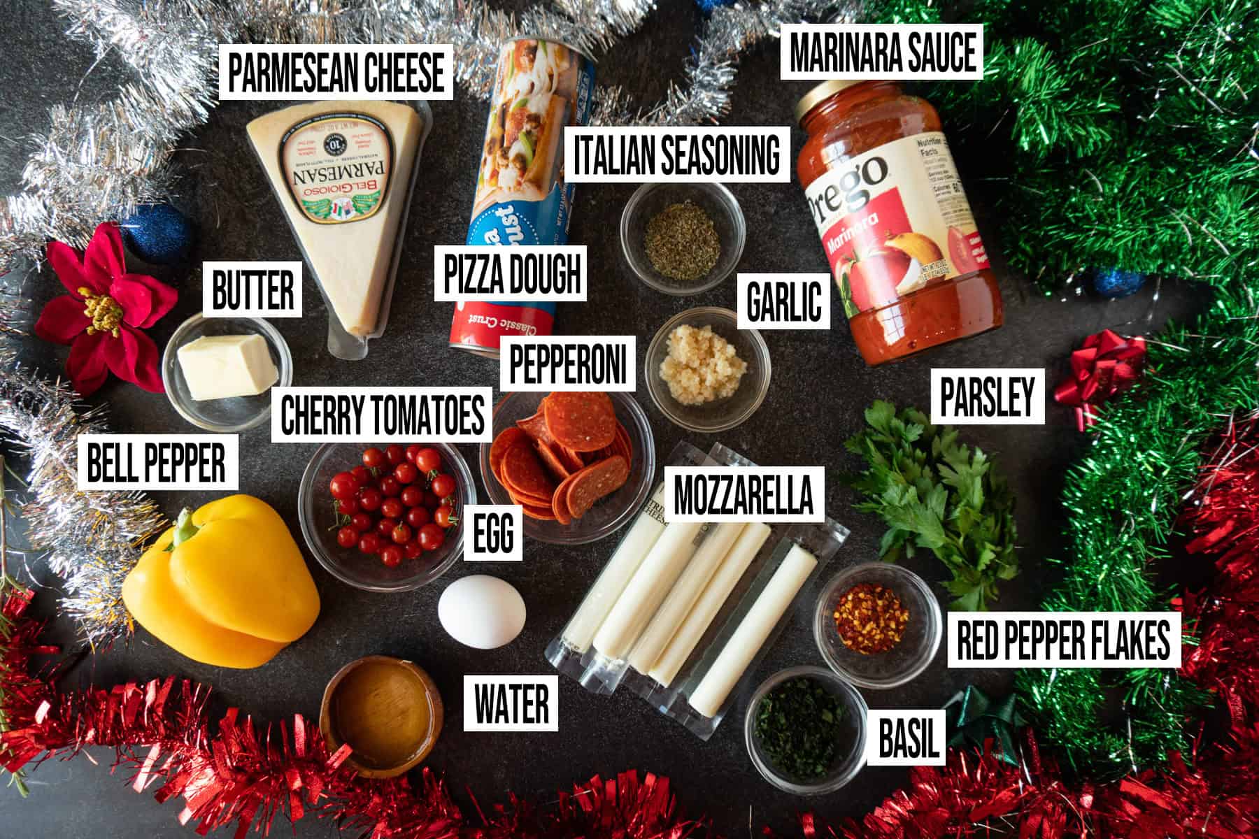 Christmas Tree Appetizer Ingredients in individual bowls and labeled