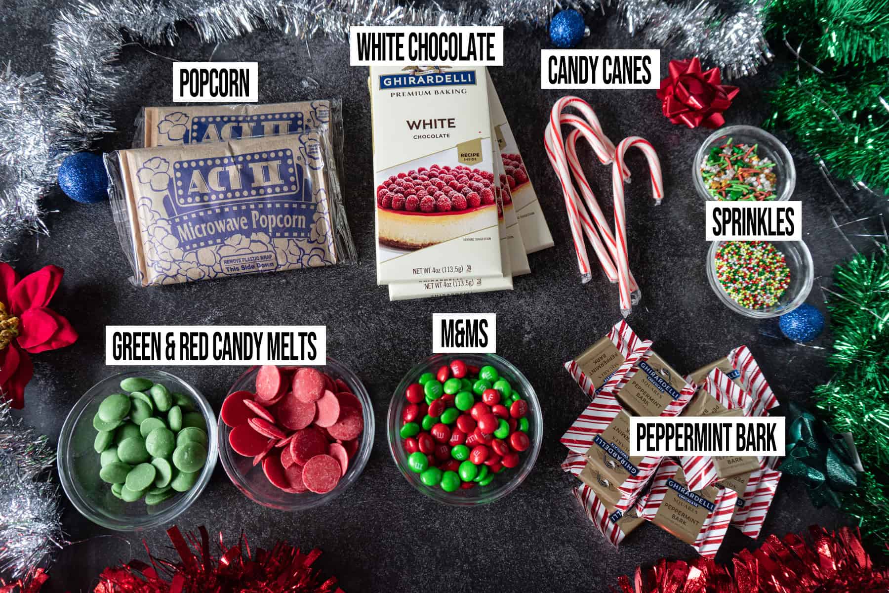 chirstmas holiday popcorn Ingredients in individual bowls and labeled