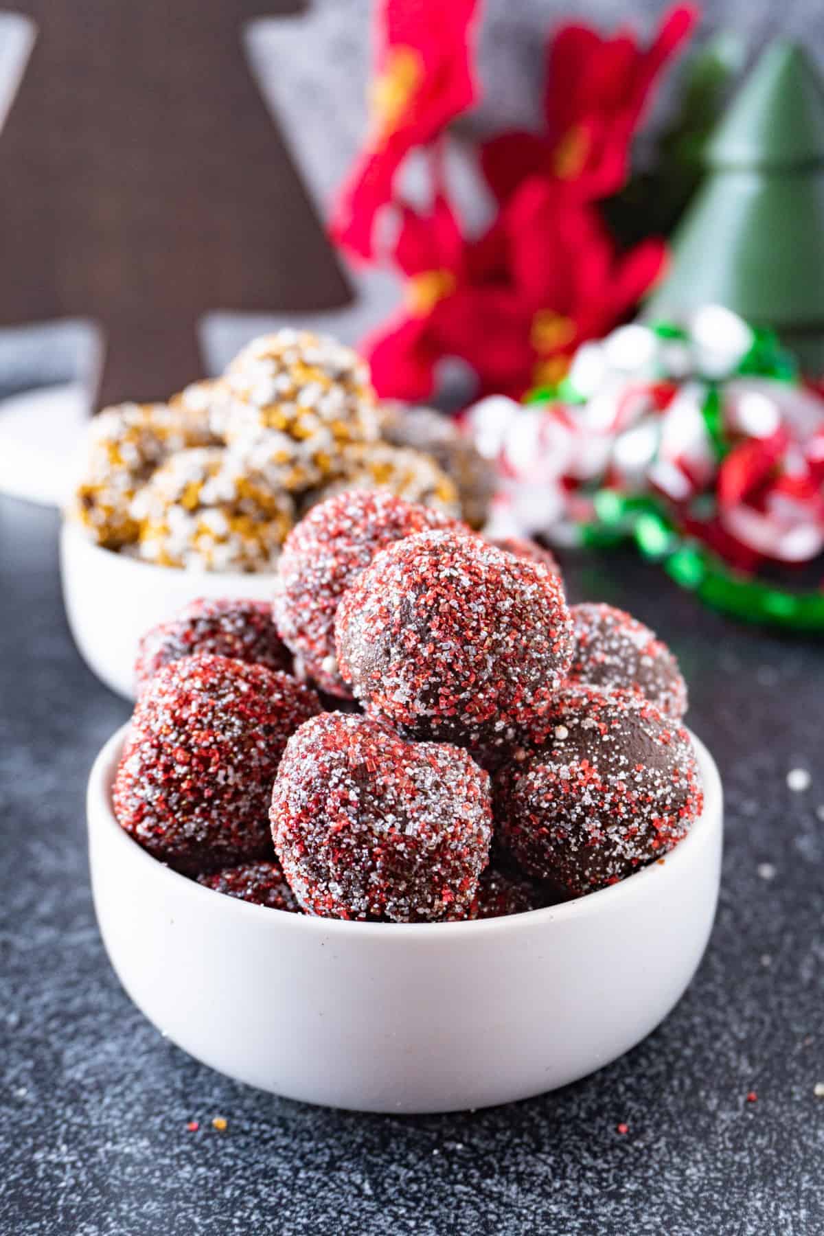 chocolate truffles with red sprinkles close up