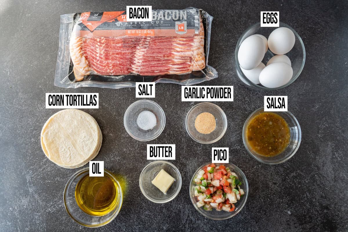 breakfast tacos recipe ingredients in individual bowls and labeled.