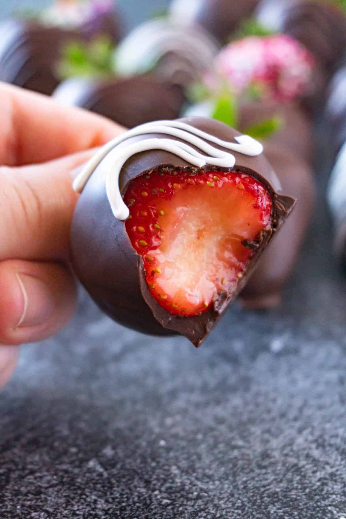 chocolate covered strawberry with bite taken out
