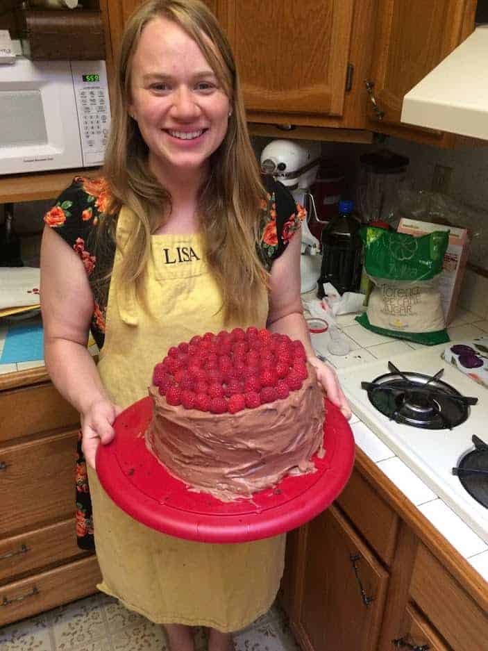 Lisa Holding a chocolate cake