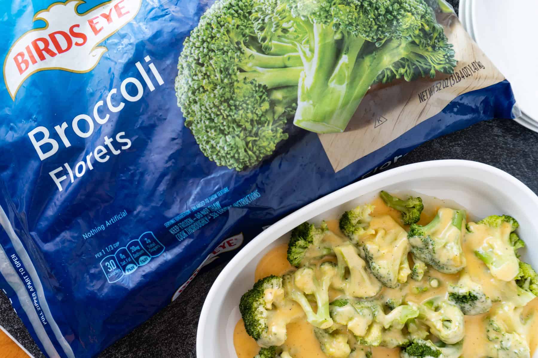 Frozen Broccoli Bag next to cheesy broccoli dish