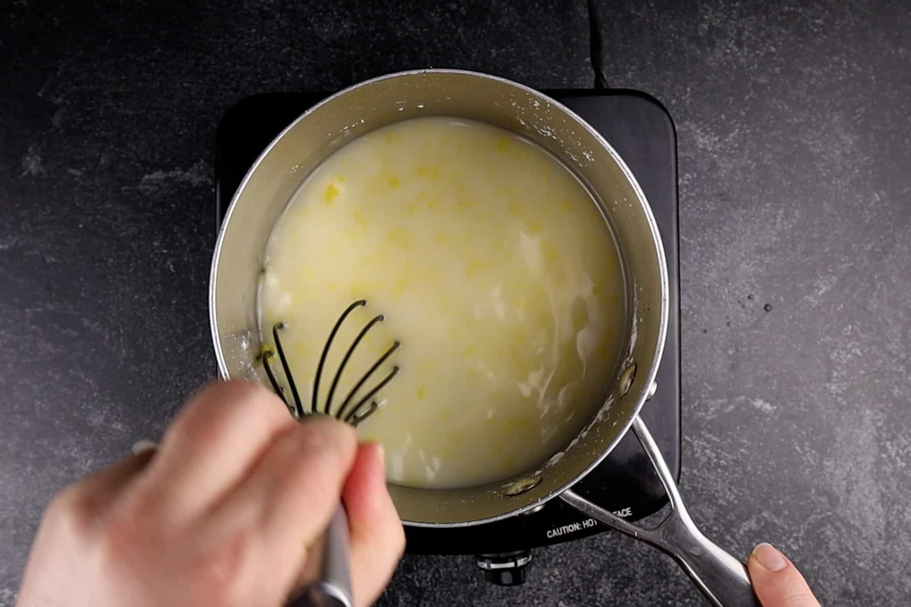 mixing the lemon filling in a sauce pan