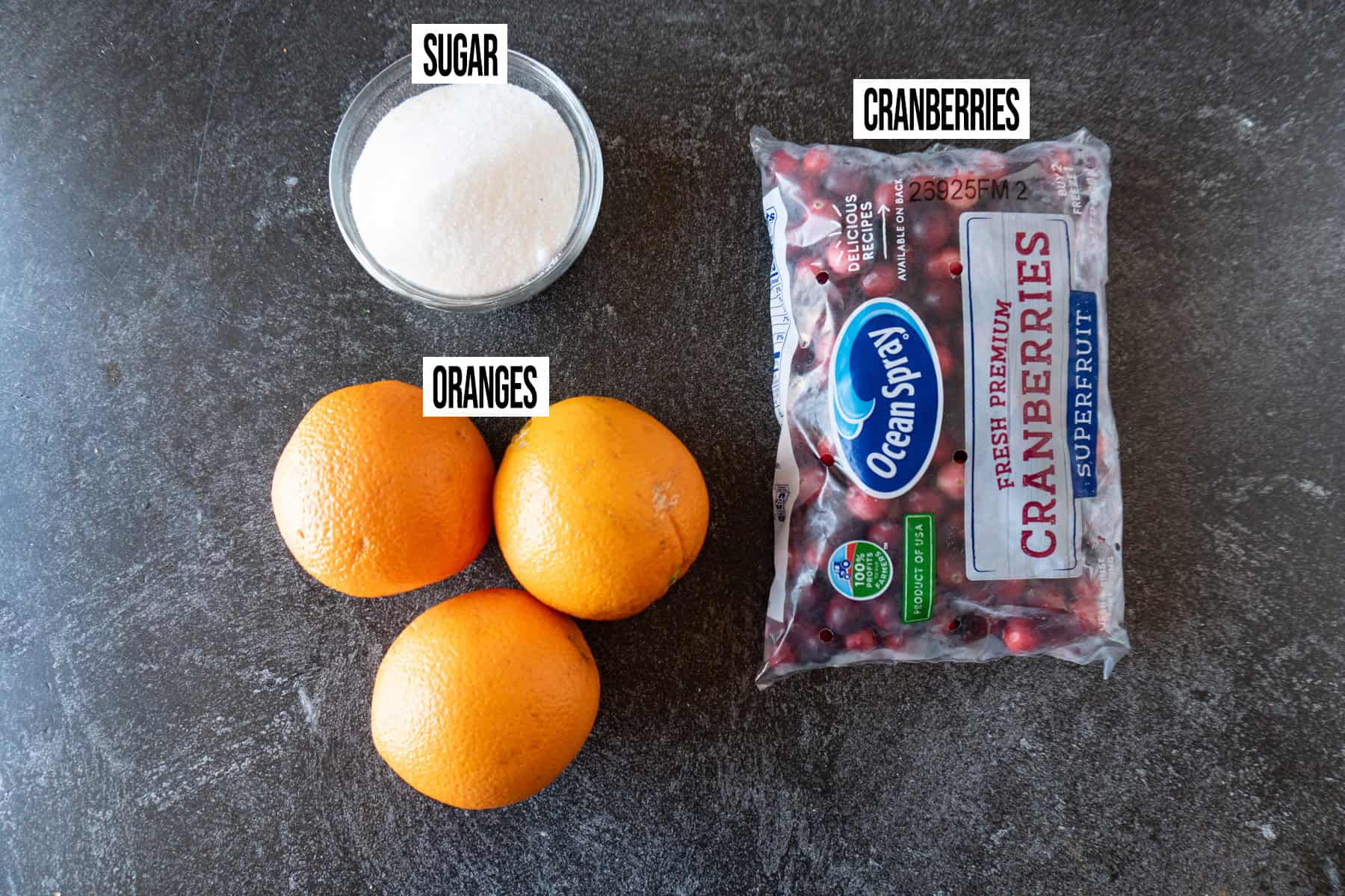Cranberry Sauce With Orange Juice Ingredients laid out and labeled.