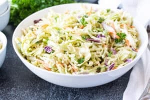 broccoli slaw in large white bowl