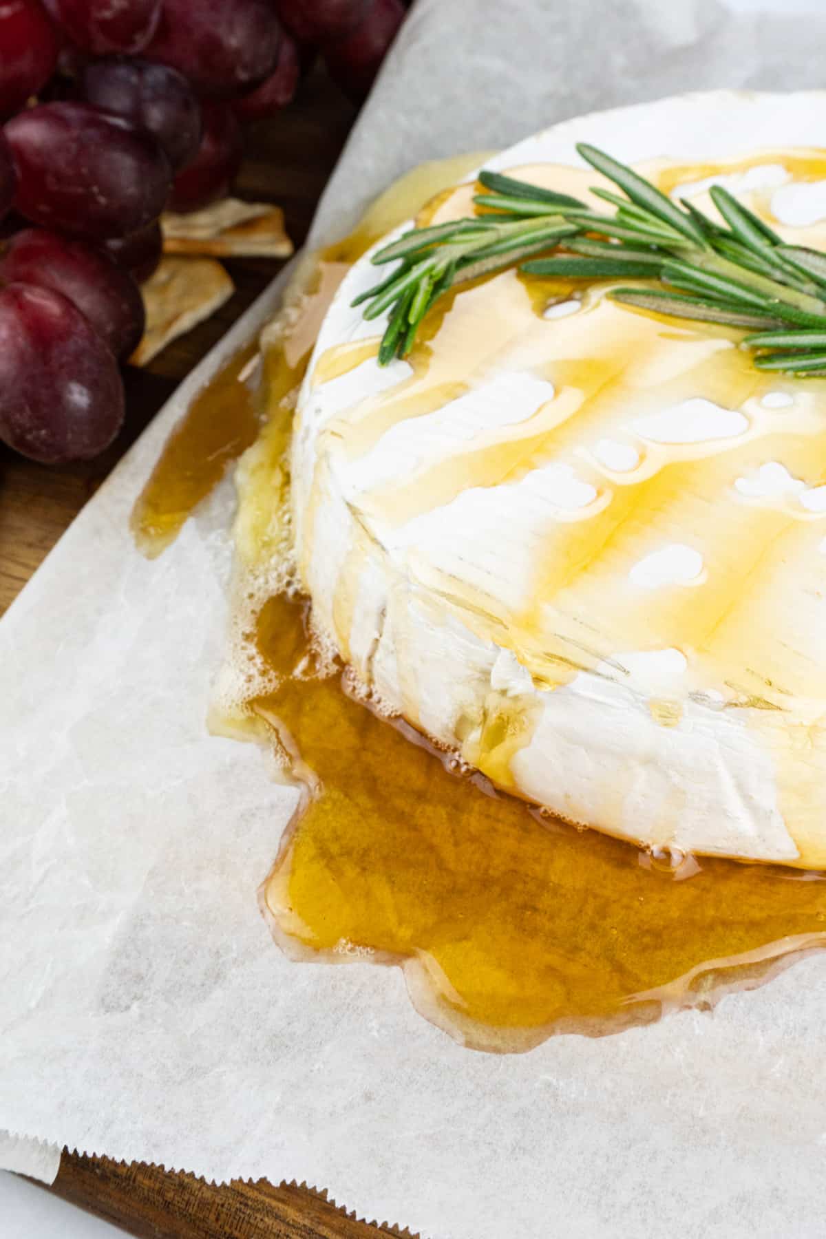 brie with honey and rosemary on top