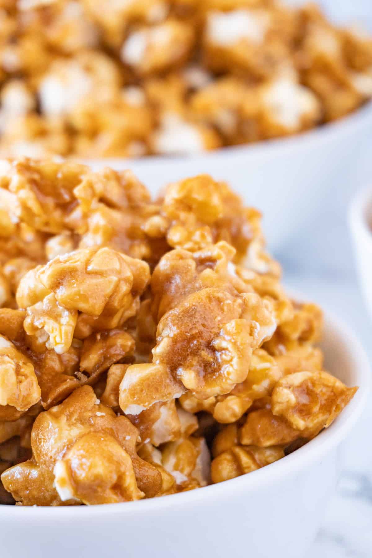 close up of caramel popcorn in bowl