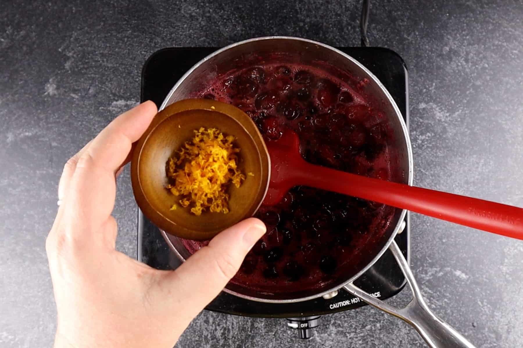 adding orange zest to relish