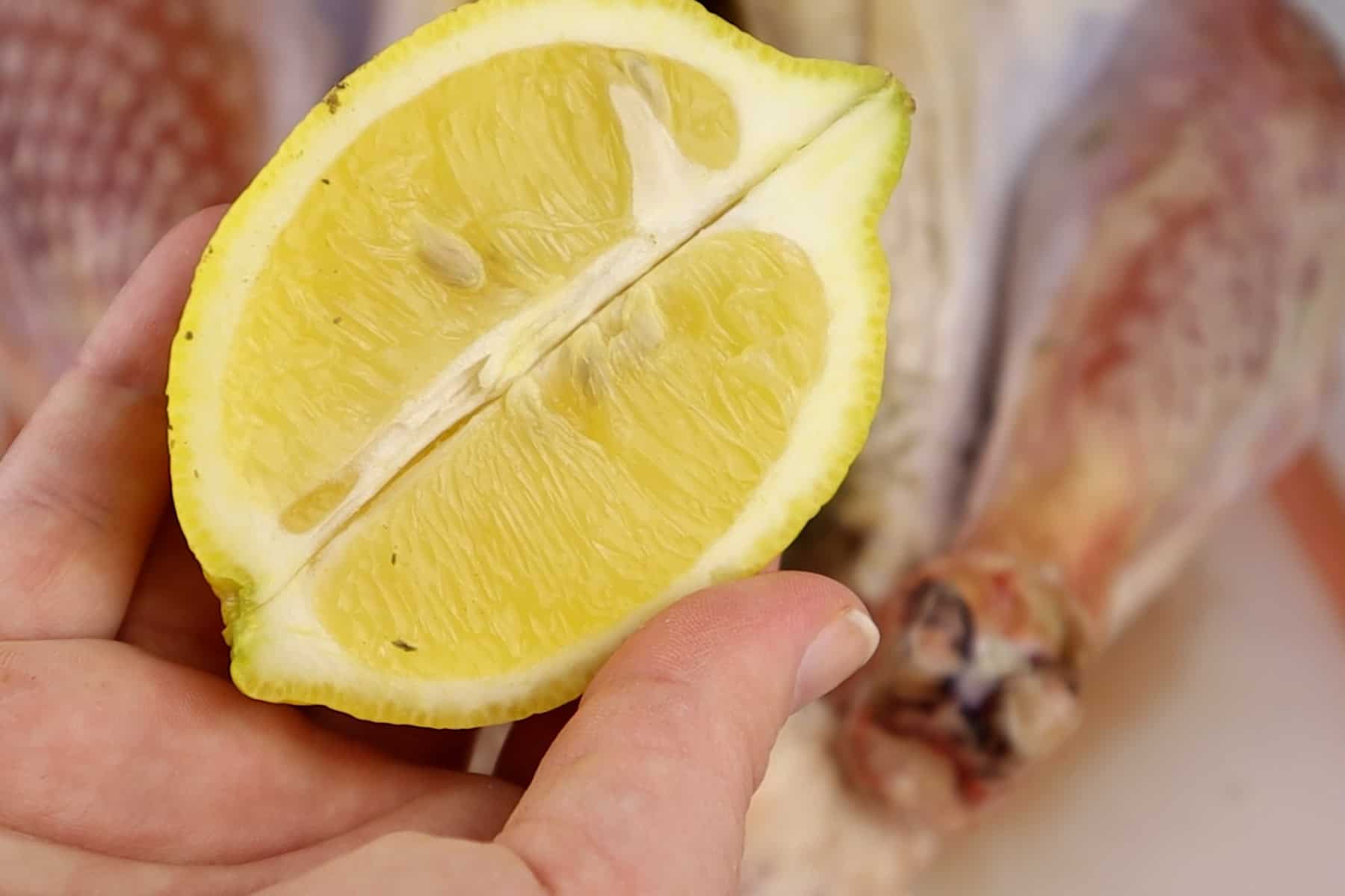 adding lemon to the turkey