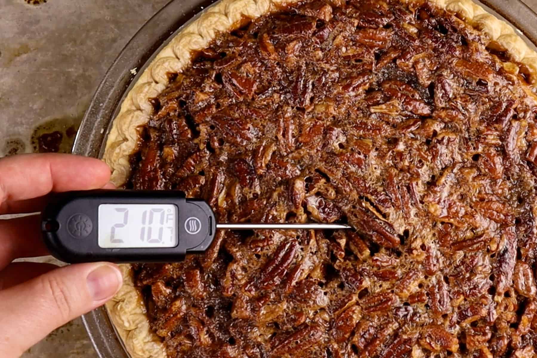 thermometer inserted in pie showing 210°F