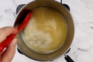 mixing broth and milk