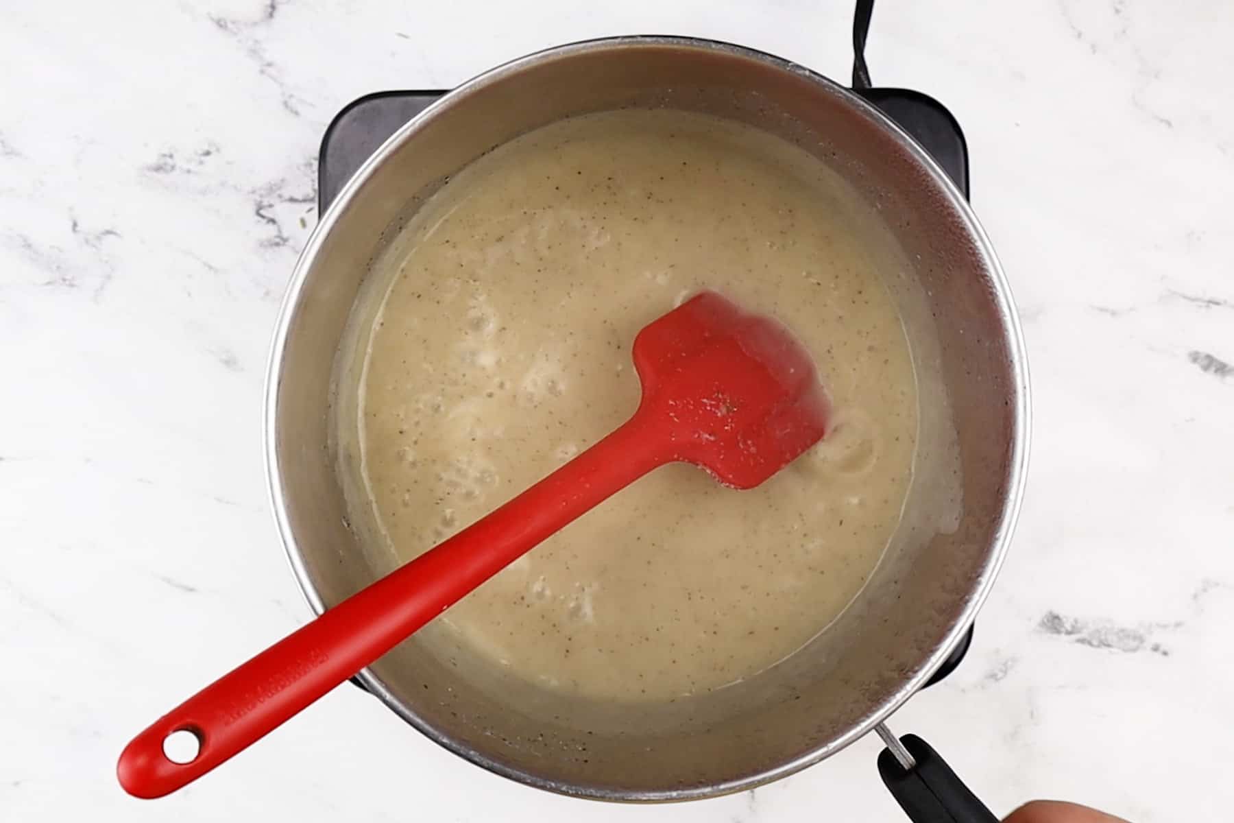 gravy boiling in sauce pan