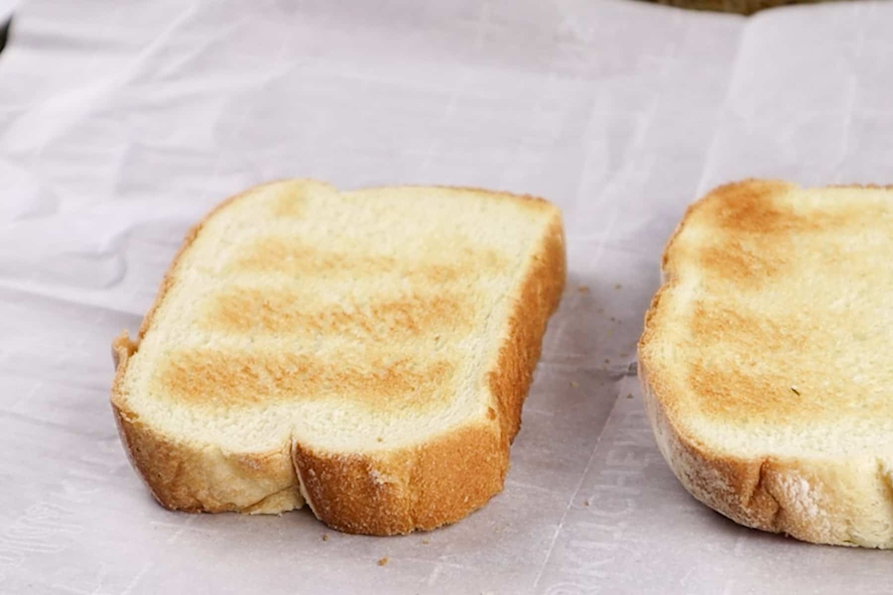 toasted bread on baking sheet